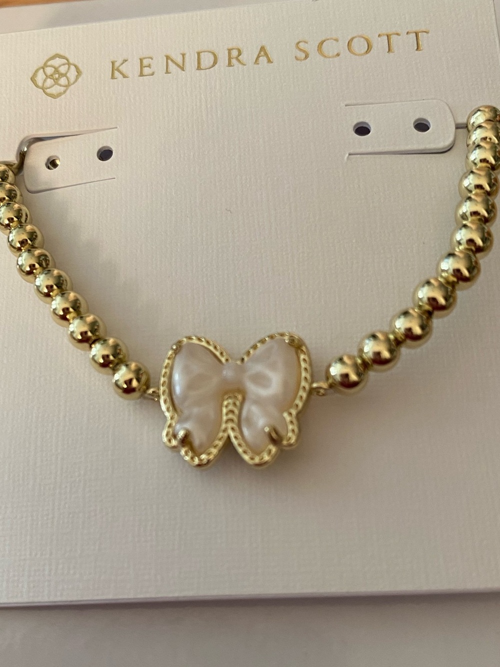 Kendra Scott Gold Beaded Bracelet with White Mother-of-Pearl Butterfly